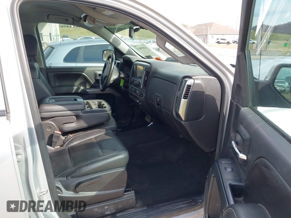 2016 Chevrolet Silverado 1500 LT with VIN 1GCUKREC9GF229979, listed as a IAAI auction lot 41859015 with 110,821 mi miles and . Bid and sale history available at DreamBid. Image 5.