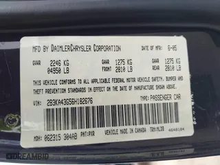 2006 Dodge Charger with VIN 2B3KA43G56H182676, listed as a IAAI auction lot 42052425 with 301,664 mi miles. Bid and sale history available at carsss.com. Image 9.
