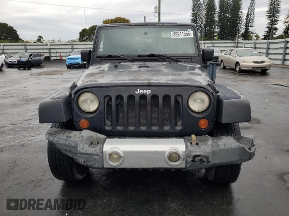 2009 Jeep Wrangler Sahara with VIN 1J4FA54109L702963, listed as a Copart auction lot 89211555 with 125,138 mi miles and Clean title. Bid and sale history available at DreamBid. Image 5.