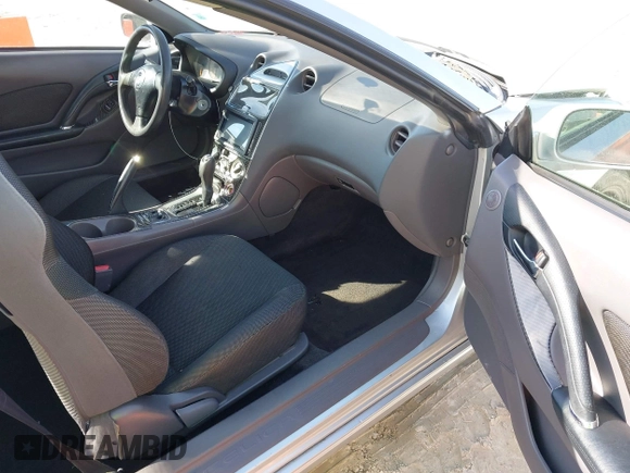 2002 Toyota Celica GT with VIN JTDDR32TX20129902, listed as a IAAI auction lot 41443750 with 203,652 mi miles. Bid and sale history available at carsss.com. Image 5.