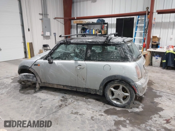 2002 MINI Hardtop with VIN WMWRC33422TC37296, listed as a IAAI auction lot 41385046 with 107,663 mi miles and . Bid and sale history available at DreamBid. Image 15.