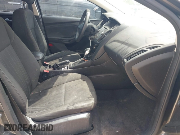 2016 Ford Focus SE with VIN 1FADP3F27GL264452, listed as a IAAI auction lot 41842240 with 180,261 mi miles. Bid and sale history available at carsss.com. Image 5.