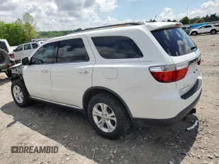2013 Dodge Durango Crew with VIN 1C4RDJDGXDC695231, listed as a Copart auction lot 56934625 with 156,858 mi miles and Salvage title. Bid and sale history available at DreamBid. Image 2.