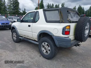 1998 Isuzu Rodeo with VIN 4S2CM57W9W4373049, listed as a IAAI auction lot 42599157 with 140,368 mi miles and . Bid and sale history available at DreamBid. Image 3.