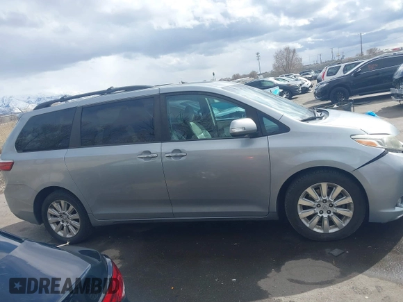 2015 Toyota Sienna XLE with VIN 5TDYK3DC2FS640204, listed as a IAAI auction lot 41772349 with 104,156 mi miles. Bid and sale history available at carsss.com. Image 14.