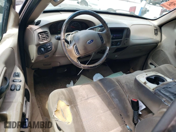 2003 Ford F-150 XL with VIN 1FTRX07213KD96765, listed as a Copart auction lot 53745465 with 292,863 mi miles and Salvage title. Bid and sale history available at DreamBid. Image 8.