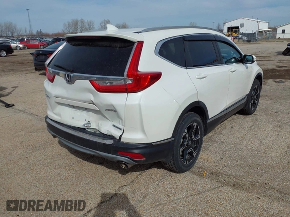 2017 Honda CR-V Touring with VIN 5J6RW2H95HL044505, listed as a IAAI auction lot 41856975 with 117,826 mi miles. Bid and sale history available at carsss.com. Image 4.