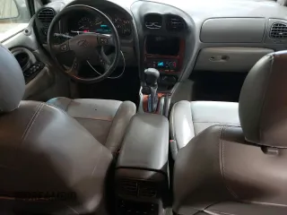 2002 Oldsmobile Bravada z VIN 1GHDT13S722200855, wystawiony jako Copart lot #76718124 z przebiegiem 186 266 mil mil oraz Szkody całkowita. Historia ofert i sprzedaży dostępna na DreamBid. Obrazek 8.