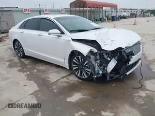 2018 Lincoln MKZ Select z VIN 3LN6L5C96JR627565, wystawiony jako IAAI lot #41580163 z przebiegiem 73 240 mil mil oraz . Historia ofert i sprzedaży dostępna na DreamBid. Obrazek 1.