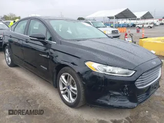 2016 Ford Fusion SE Hybrid with VIN 3FA6P0LU5GR356433, listed as a IAAI auction lot 41799204 with 157,670 mi miles. Bid and sale history available at carsss.com. Image 1.