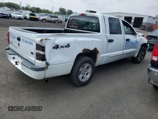 2006 Dodge Dakota SLT z VIN 1D7HW48N76S671886, wystawiony jako Copart lot #59487655 z przebiegiem Nie podano mil oraz Szkoda całkowita • Salvage title. Historia ofert i sprzedaży dostępna na DreamBid. Obrazek 3.
