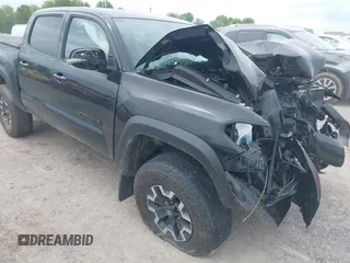 2023 Toyota Tacoma SR with VIN 3TMCZ5AN2PM598464, listed as a IAAI auction lot 42238032 with 35,597 mi miles and . Bid and sale history available at DreamBid. Image 6.