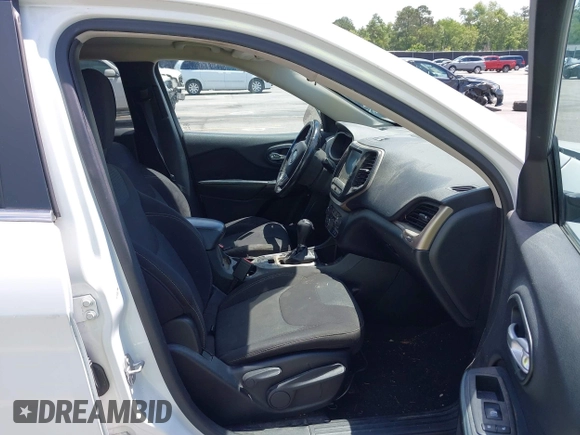 2016 Jeep Cherokee Latitude with VIN 1C4PJLCB0GW291357, listed as a IAAI auction lot 42312356 with 105,692 mi miles and . Bid and sale history available at DreamBid. Image 5.