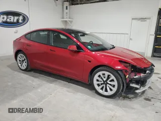 2023 Tesla Model 3 with VIN 5YJ3E1EA8PF448830, listed as a Copart auction lot 54058455 with 47,395 mi miles and Clean Title. Bid and sale history available at DreamBid. Image 4.