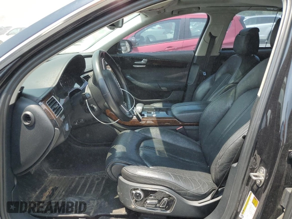 2012 Audi A8 with VIN WAURVAFDXCN026781, listed as a Copart auction lot 59197615 with 160,567 mi miles and Salvage title. Bid and sale history available at DreamBid. Image 7.