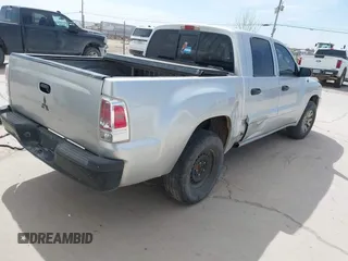 2006 Mitsubishi Raider LS z VIN 1Z7HT28KX6S576515, wystawiony jako IAAI lot #42180535 z przebiegiem 169 922 mil mil oraz . Historia ofert i sprzedaży dostępna na DreamBid. Obrazek 4.