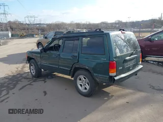 2000 Jeep Cherokee Classic with VIN 1J4FF58S6YL105920, listed as a IAAI auction lot 41497047 with 192,410 mi miles. Bid and sale history available at carsss.com. Image 3.