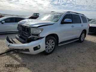 2014 Toyota Sequoia Platinum with VIN 5TDDW5G11ES105503, listed as a Copart auction lot 83012994 with 153,143 mi miles and Salvage Title. Bid and sale history available at carsss.com. Image 1.
