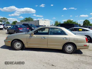 2001 Hyundai XG z VIN KMHFU45D91A086966, wystawiony jako IAAI lot #42331492 z przebiegiem 88 803 mil mil oraz . Historia ofert i sprzedaży dostępna na DreamBid. Obrazek 14.