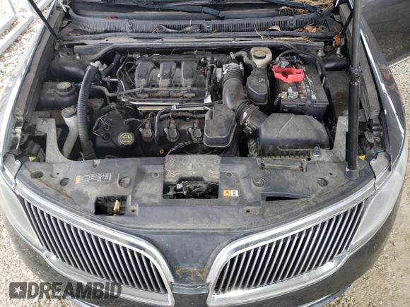 2016 Lincoln MKS z VIN 1LNHL9DK9GG601740, wystawiony jako Copart lot #60557565 z przebiegiem 89 350 mil mil oraz Szkoda całkowita • Salvage title. Historia ofert i sprzedaży dostępna na DreamBid. Obrazek 11.