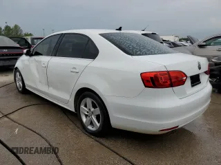 2014 Volkswagen Jetta TDI w/Premium with VIN 3VWLL7AJ2EM410482, listed as a Copart auction lot 53691984 with 77,421 mi miles and Salvage title. Bid and sale history available at DreamBid. Image 2.