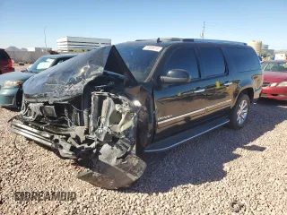 2012 GMC Yukon XL Denali with VIN 1GKS1MEF5CR223214, listed as a Copart auction lot 79906974 with 112,256 mi miles and Salvage Title. Bid and sale history available at carsss.com. Image 1.