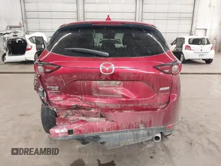 2018 Mazda CX-5 Grand Touring with VIN JM3KFBDM5J0414013, listed as a IAAI auction lot 42013479 with 88,225 mi miles and . Bid and sale history available at DreamBid. Image 17.