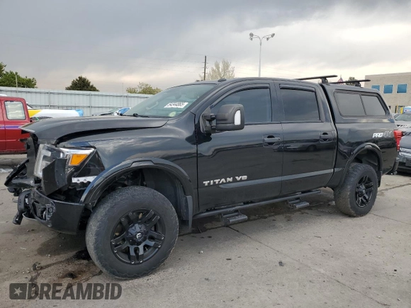2019 Nissan Titan Pro-4X z VIN 1N6AA1E53KN508400, wystawiony jako Copart lot #54344865 z przebiegiem 59 028 mil mil oraz Szkoda całkowita • Salvage title. Historia ofert i sprzedaży dostępna na DreamBid. Obrazek 1.