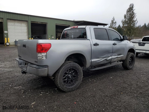 2013 Toyota Tundra 4WD Truck with VIN 5TFDM5F19DX047348, listed as a Copart auction lot 85330014 with 128,205 mi miles and Salvage Title. Bid and sale history available at carsss.com. Image 3.