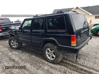 2001 Jeep Cherokee Sport с VIN 1J4FF48S31L615450, выставлен на аукционе Copart как лот 55835585 с пробегом 246 694 миль миль и Списание • Salvage title. История ставок и продаж доступна на DreamBid. Изображение 2.
