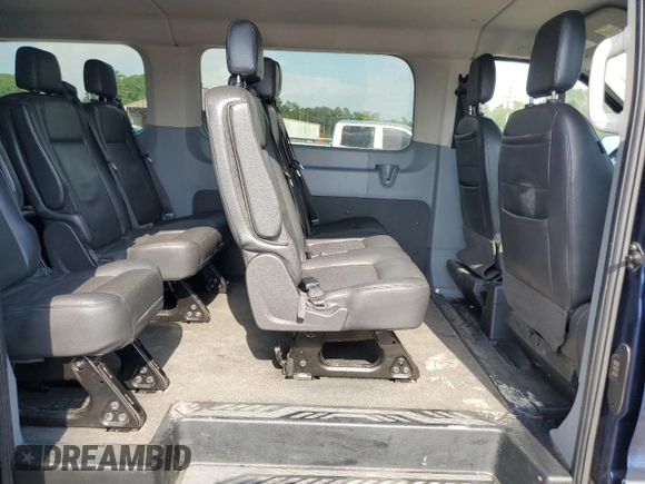 2018 Ford Transit Passenger XL z VIN 1FBZX2YG2JKB39878, wystawiony jako Copart lot #54557905 z przebiegiem 132 974 mil mil oraz Szkoda całkowita • Salvage title. Historia ofert i sprzedaży dostępna na DreamBid. Obrazek 11.