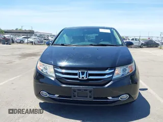 2014 Honda Odyssey Touring with VIN 5FNRL5H99EB133864, listed as a IAAI auction lot 42201359 with 122,490 mi miles and . Bid and sale history available at DreamBid. Image 12.