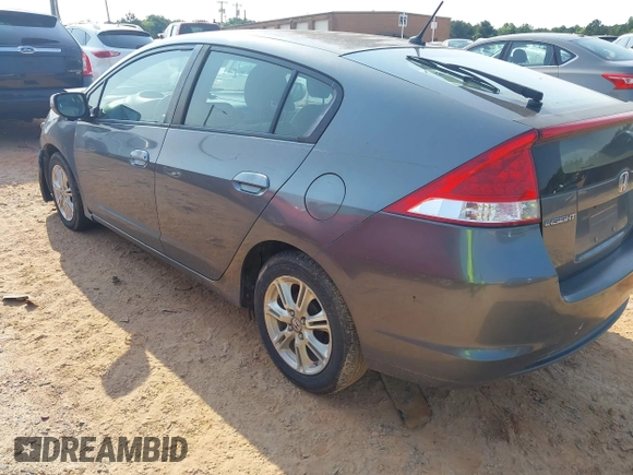 2010 Honda Insight EX with VIN JHMZE2H74AS027020, listed as a IAAI auction lot 42394875 with 248,003 mi miles and . Bid and sale history available at DreamBid. Image 3.