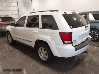2010 Jeep Grand Cherokee Laredo with VIN 1J4PR4GK1AC143486, listed as a IAAI auction lot 41761763 with 159,139 mi miles. Bid and sale history available at carsss.com. Image 3.