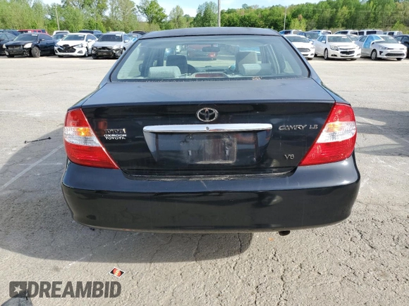 2002 Toyota Camry XLE z VIN 4T1BF32K02U034535, wystawiony jako Copart lot #53894995 z przebiegiem 253 037 mil mil oraz Szkoda całkowita • Salvage title. Historia ofert i sprzedaży dostępna na DreamBid. Obrazek 6.
