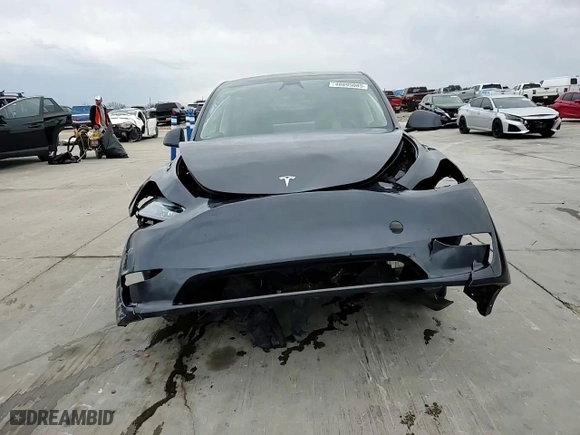 2024 Tesla Model Y Long Range with VIN 7SAYGDEE8RA304900, listed as a Copart auction lot 48895085 with 14,766 mi miles and Salvage Title. Bid and sale history available at carsss.com. Image 12.