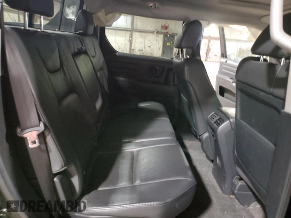 2010 Honda Ridgeline RTL with VIN 5FPYK1F5XAB011944, listed as a Copart auction lot 52434175 with 137,585 mi miles and Salvage title. Bid and sale history available at DreamBid. Image 11.