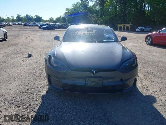 2022 Tesla Model S with VIN 5YJSA1E57NF479056, listed as a IAAI auction lot 42091009 with 78,272 mi miles and . Bid and sale history available at DreamBid. Image 12.