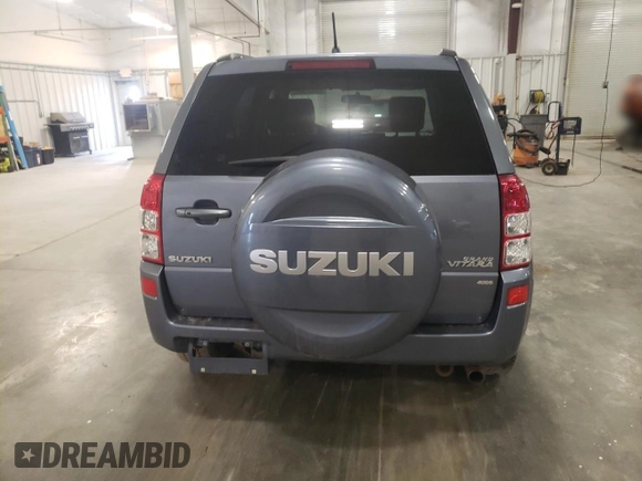 2007 Suzuki Grand Vitara Luxury z VIN JS3TD947774200407, wystawiony jako Copart lot #52001965 z przebiegiem Nie podano mil oraz Szkoda całkowita • Salvage title. Historia ofert i sprzedaży dostępna na DreamBid. Obrazek 6.