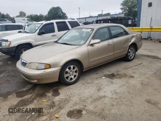 1998 Mazda 626 DX with VIN 1YVGF22C1W5762498, listed as a Copart auction lot 78283944 with 210,639 mi miles and Salvage Title. Bid and sale history available at carsss.com. Image 1.