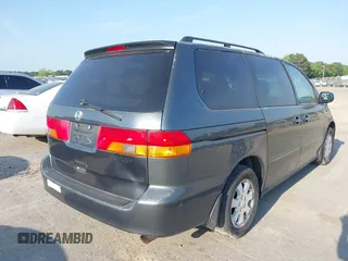 2003 Honda Odyssey EX with VIN 5FNRL18673B112958, listed as a IAAI auction lot 42172282 with 189,521 mi miles and . Bid and sale history available at DreamBid. Image 4.