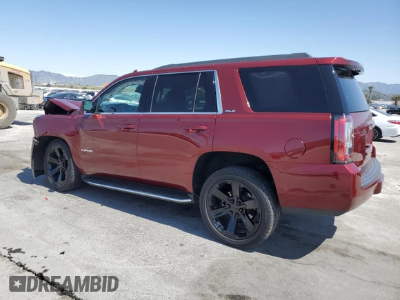 2019 GMC Yukon SLE with VIN 1GKS1AKC9KR355643, listed as a Copart auction lot 52050855 with 50,729 mi miles and Salvage Title. Bid and sale history available at carsss.com. Image 2.