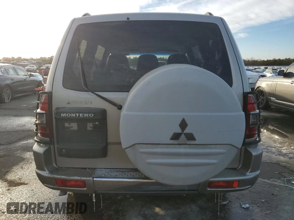 2002 Mitsubishi Montero Limited z VIN JA4MW51R12J020808, wystawiony jako Copart lot #41915255 z przebiegiem 127 834 mil mil oraz Czysty tytuł • Clean title. Historia ofert i sprzedaży dostępna na DreamBid. Obrazek 6.