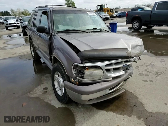 1996 Ford Explorer XL z VIN 1FMDU34X6TZB71667, wystawiony jako Copart lot #51969375 z przebiegiem 226 288 mil mil oraz Szkody całkowita. Historia ofert i sprzedaży dostępna na DreamBid. Obrazek 11.