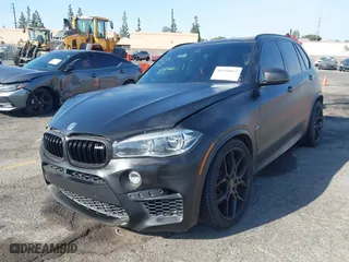 2016 BMW X5 M with VIN 5YMKT6C51G0R79331, listed as a IAAI auction lot 40590865 with 80,772 mi miles. Bid and sale history available at carsss.com. Image 19.