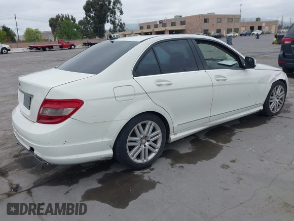 2009 Mercedes-Benz C-Class 3.0L Sport with VIN WDDGF54X19R082613, listed as a IAAI auction lot 42078992 with 140,707 mi miles. Bid and sale history available at carsss.com. Image 4.