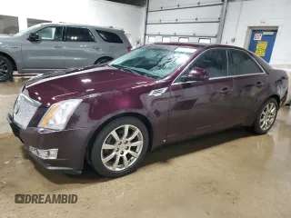 2009 Cadillac CTS AWD z VIN 1G6DT57V990136974, wystawiony jako Copart lot #50154525 z przebiegiem 196 934 mil mil oraz Szkody całkowita. Historia ofert i sprzedaży dostępna na DreamBid. Obrazek 1.