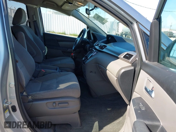 2016 Honda Odyssey SE with VIN 5FNRL5H32GB153002, listed as a IAAI auction lot 42084022 with 63,764 mi miles and . Bid and sale history available at DreamBid. Image 5.