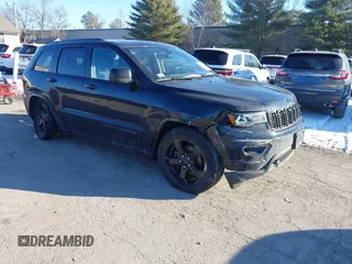 2018 Jeep Grand Cherokee Laredo E with VIN 1C4RJFAGXJC375588, listed as a IAAI auction lot 41406344 with 69,989 mi miles. Bid and sale history available at carsss.com. Image 1.