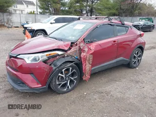 2018 Toyota C-HR XLE z VIN NMTKHMBX7JR005504, wystawiony jako IAAI lot #41806239 z przebiegiem 114 475 mil mil oraz . Historia ofert i sprzedaży dostępna na DreamBid. Obrazek 2.